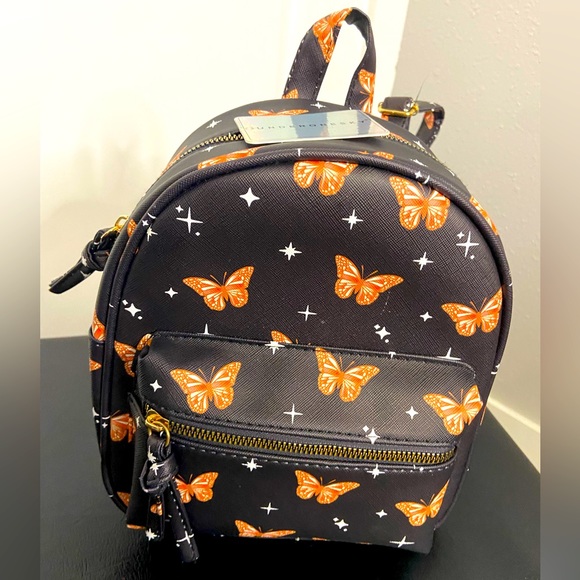 Under One Sky Handbags - NWT “Underonesky” butterfly backpack